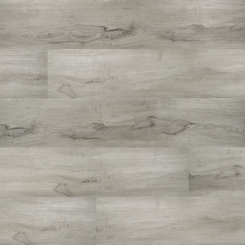 A close-up of MSIs Cyrus Dunite Oak Luxury Vinyl Planks BOX (23.77 SQFT), light gray waterproof flooring with subtle grain and knots, in a staggered plank layout and featuring easy click-lock installation.